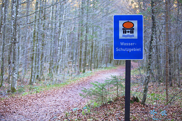 Shild in the forest show Wasserschutzgebiet on a autumn day.