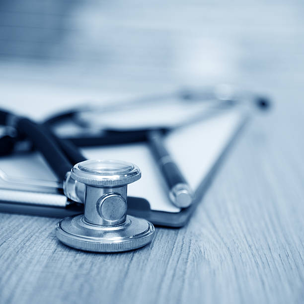 istock clipboard with stethoscope and pen 530458717