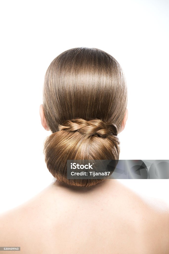Beautiful hairstyle Woman from behind with beautiful hairstyle Hair Bun Stock Photo
