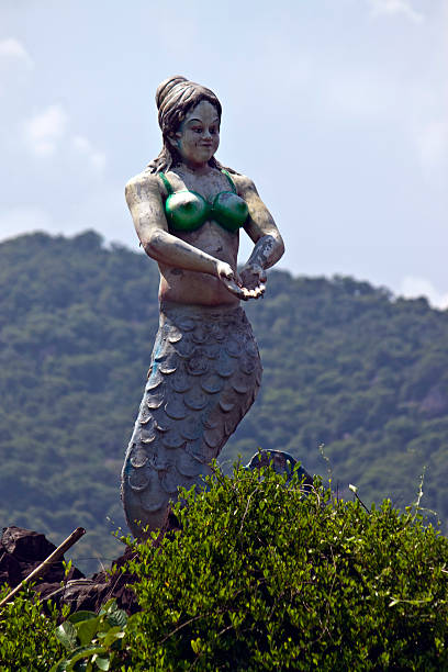 istock Old statue of mermaid in Goa 530459997