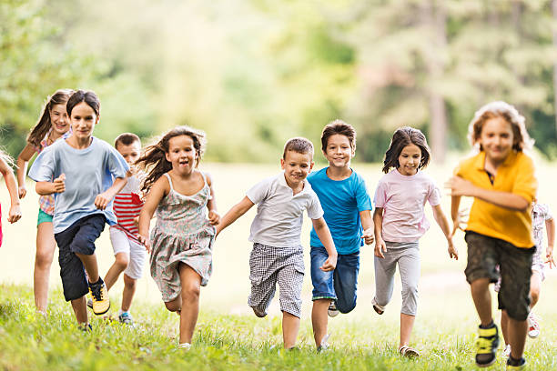 istock Children running in the park. 530460657