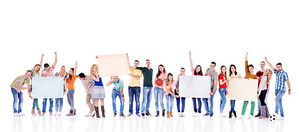 istock Group of young people holding white papers. 530466177