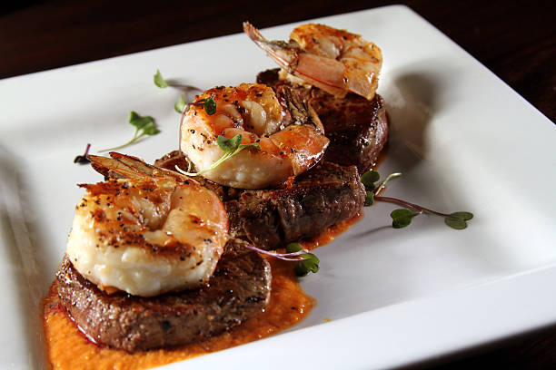 istock Gourmet surf and turf on a white plate 530467543
