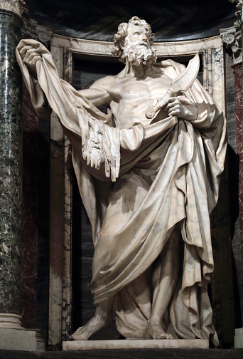 Statue of Bartholomew the apostle into a niche in the Archbasilica of St. John Lateran, Rome Italy