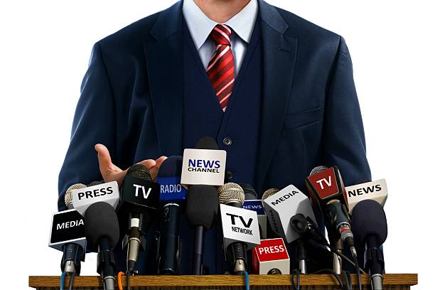 istock Businessman at Press Conference 530470075