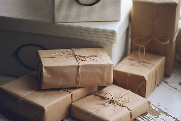istock gift boxes wrapped in brown paper 530477461