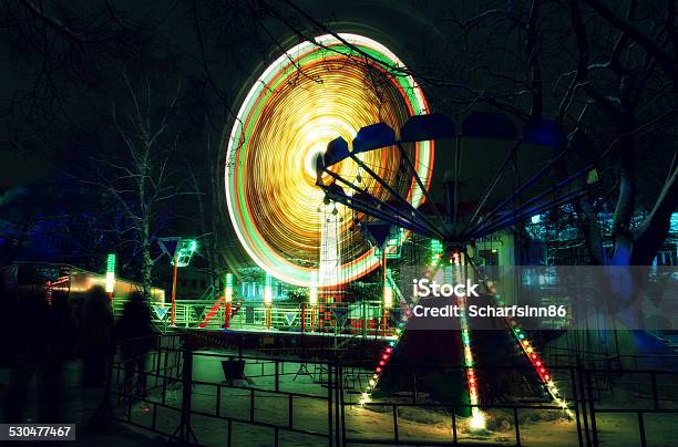 City Attraction At Night Stock Photo - Download Image Now - Blurred Motion, Capital Cities, Car