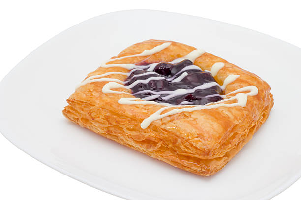 istock danish pastry with blueberry on white background 530478465