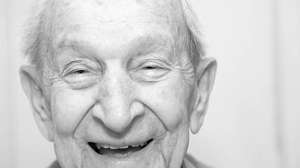istock Senior man laughing close-up monochrome 530479479