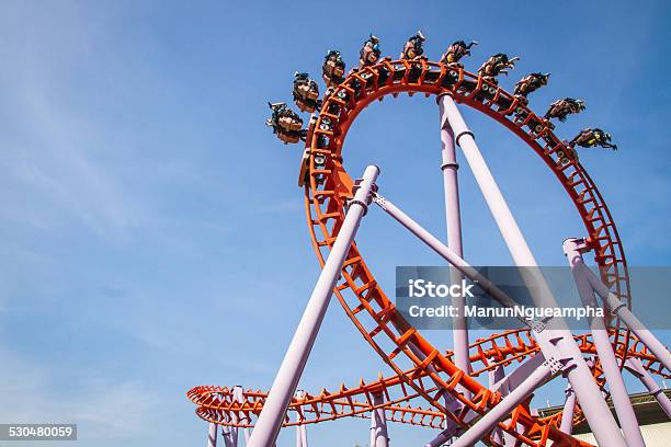 Rollercoaster Against Blue Sky Stock Photo - Download Image Now - Rollercoaster, Loopable Elements, Upside Down