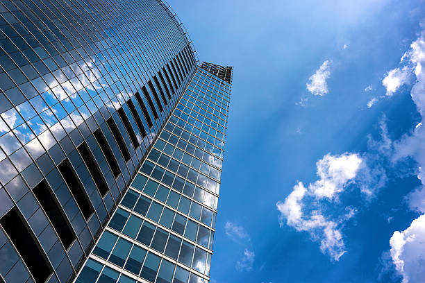 istock Reflection of clouds in a modern building 530481829