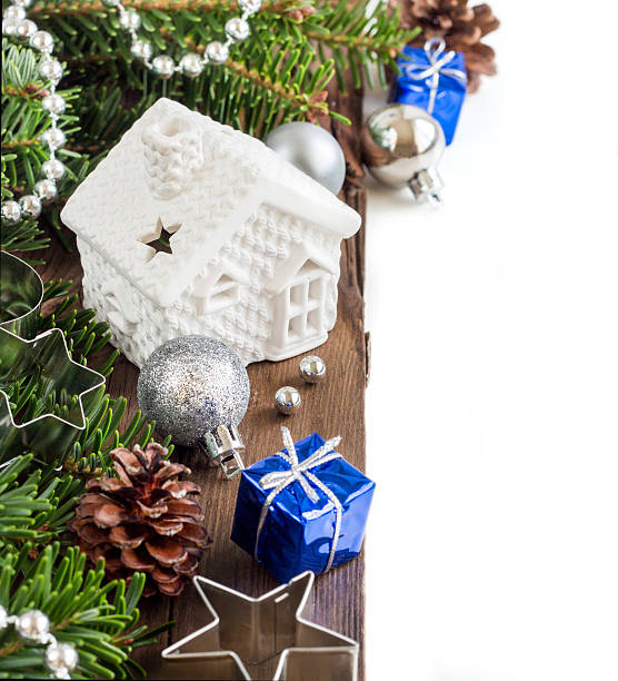 istock Festive decorations with small house, baubles and gift boxes 530482573