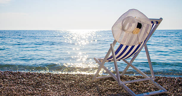 istock Striped deck chair on beach at Vis island 530483782