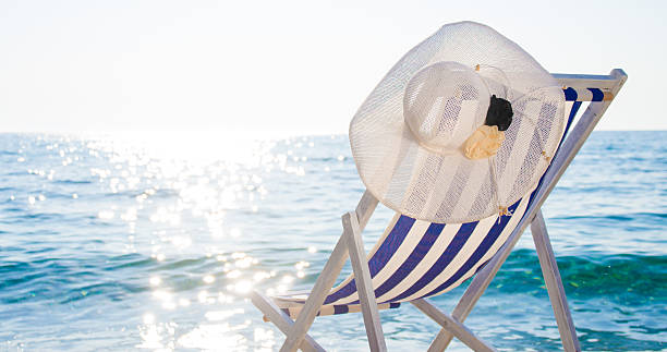 istock Sun hat on deck chair by sea at Vis island 530483820