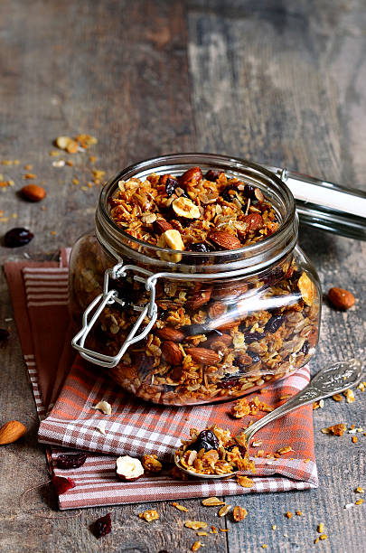 istock Granola in a glass jar. 530484073