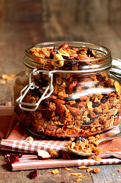 istock Granola in a glass jar. 530484081
