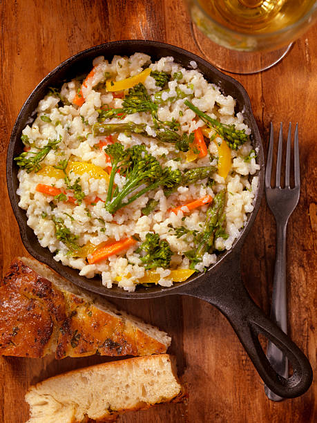 istock Vegetable Risotto with Fresh Parsley and Focaccia Bread 530484502