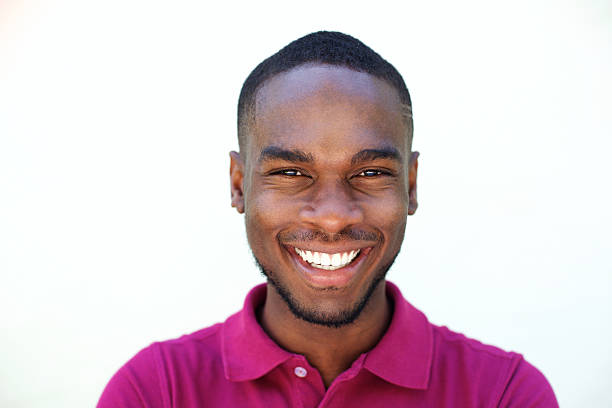 istock Close up smiling young african american man 530486862