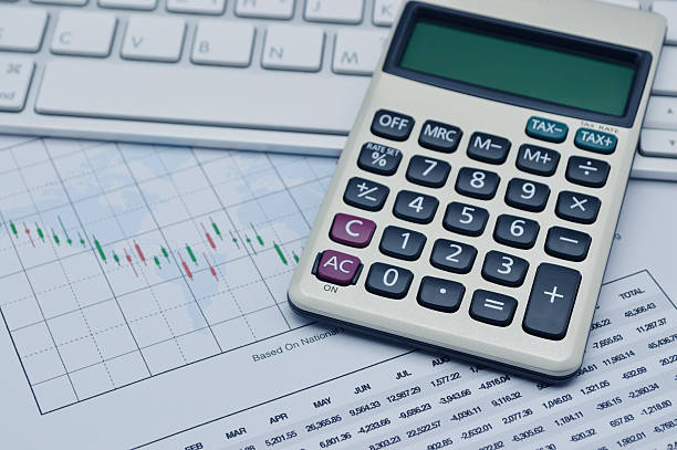 istock Calculator button plus on keyboard and graph paper, accounting concept 530488936