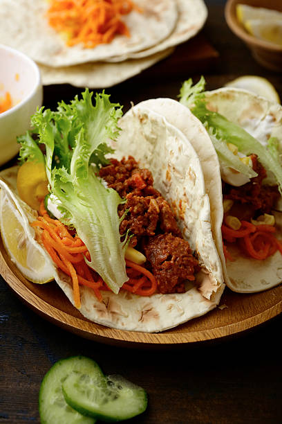 istock Mexican Tacos with ground beef and different vegetables 530489024