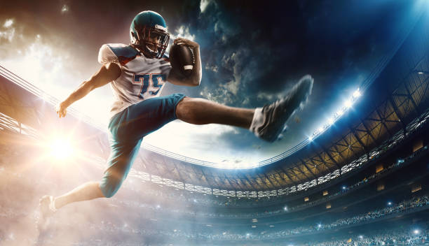 istock Football player runs with the ball 530489114