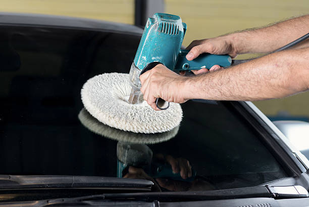 istock Car detailing series : Polishing windshield 530489306