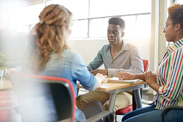istock Unposed group of creative business people in an open concept 530489876