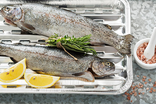 istock Rainbow trout ready to be grilled 530489958