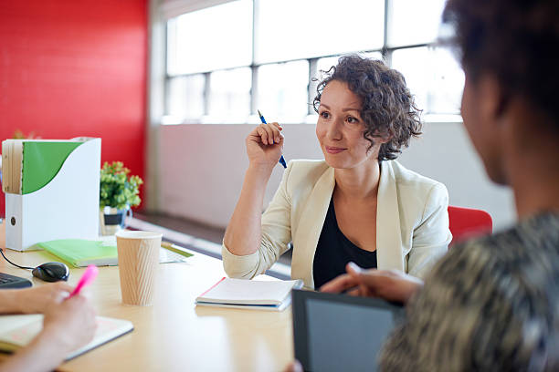 istock Unposed group of creative business people in an open concept 530489960
