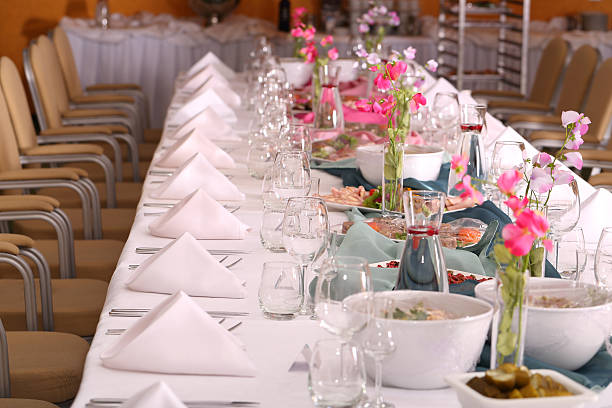 banquet table and food stock photo