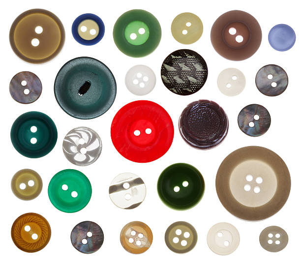 istock Collection of various sewing button on white background 530490257