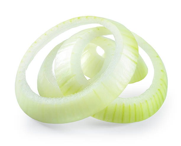 istock Onion slice. Rings isolated on white background 530490358