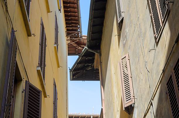 istock Overlapping roofs on a medieval alley, Florence 530491707