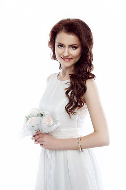 istock Beautiful young bride with a bouquet 530491977