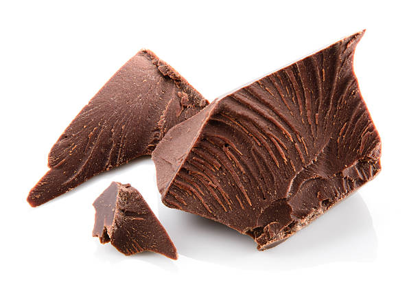 istock Chocolate pieces isolated on white. 530492738