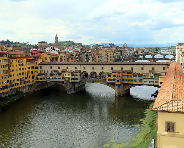 istock bridge called Ponte Vecchio and Vasari Corridor in Florence Ital 530493176
