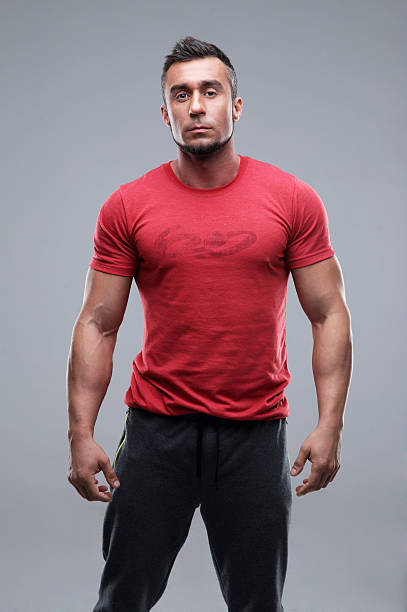 istock young serious man in red t-shirt 530493191