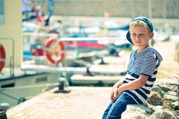 istock Boy in the port. 530493606