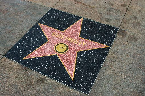 Los Angeles, USA - April 18, 2014: Elvis Presley star on Hollywood Walk of Fame in Hollywood, California. This star is located on Hollywood Blvd. and is one of over 2000 celebrity stars embedded in the sidewalk.