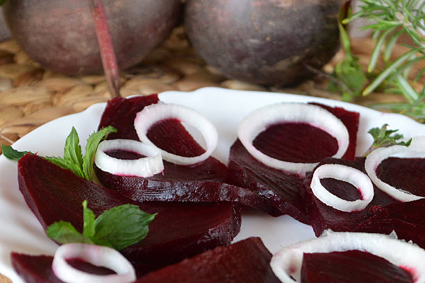 istock Fresh sliced organic beetroot salad with onion 530496214