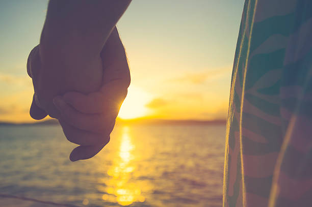 istock Couple of lovers holding hands 530500320