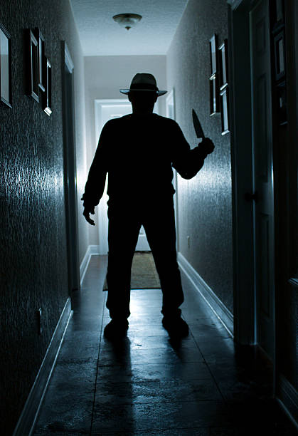 istock Man in Hall With Knife 530500542