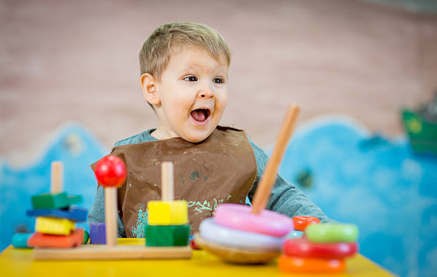 istock Kid is playing with toys in nursery 530501562