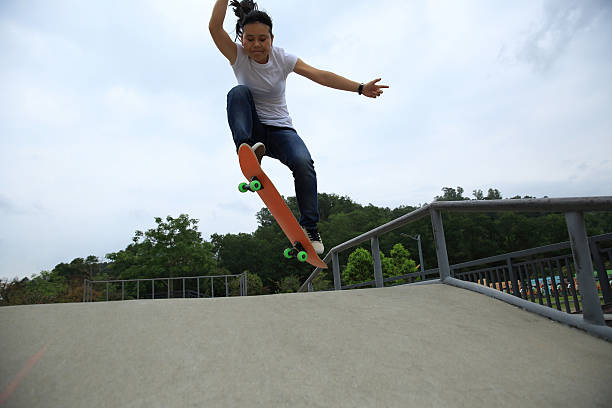 istock skateboarder skateboarding at skatepark 530501596
