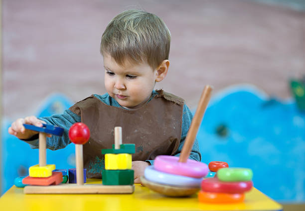 istock Kid is playing with toys in nursery 530501688