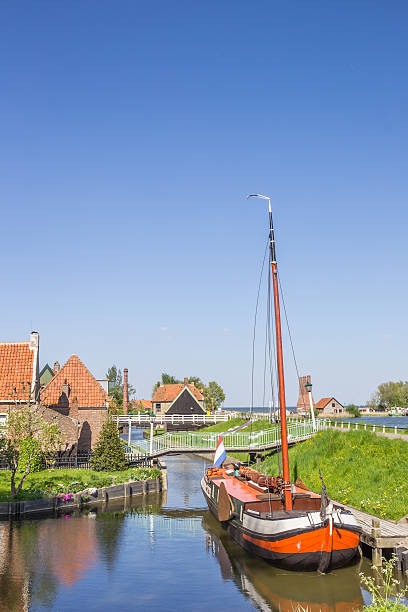 istock Old sailing ship in a canal in Enkhuizen 530502506