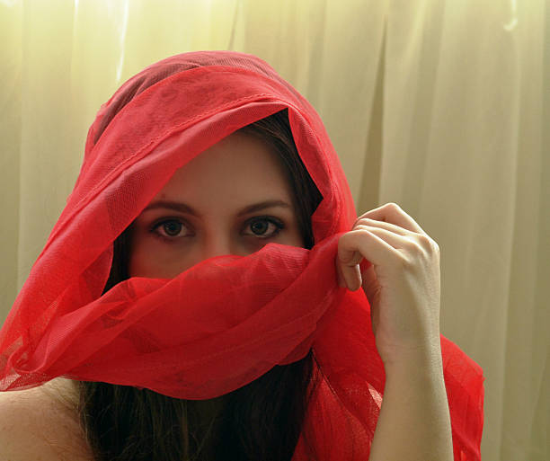istock spectacular woman in red cape 530505501