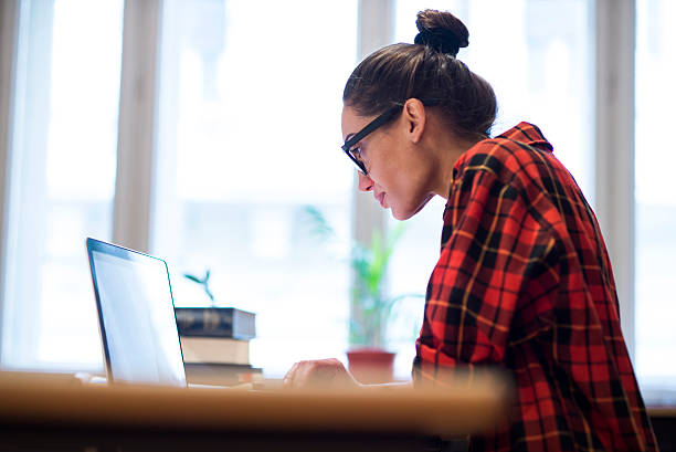 istock Young woman at work 530506354