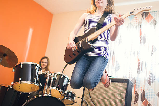 istock Girls Playing Rock and Roll At Home 530506666