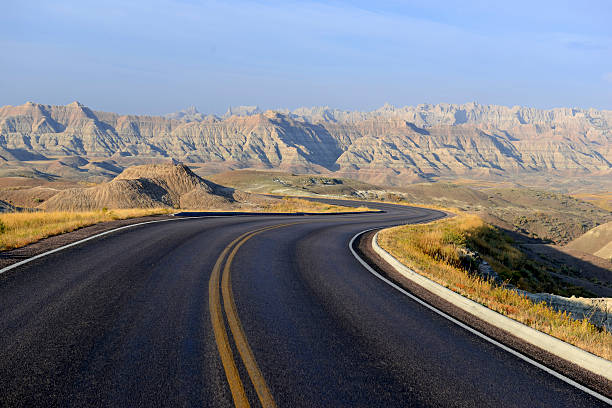 Harsh and remote Badlands landscape, South Dakota Badlands landscape, formed by deposition and erosion by wind and water, contains some of the richest fossil beds in the world, Badlands National Park, South Dakota, USA barron gorge national park stock pictures, royalty-free photos & images